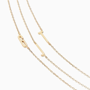 Minimalist gold stainless steel initial necklaces featuring G, I, and T letter pendants