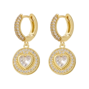 Boucles d'oreilles huggies dorées avec pendentif en oxyde de zirconium en forme de cœur