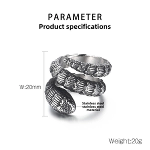 Macro detail of retro coiled snake ring in stainless steel with textured scales