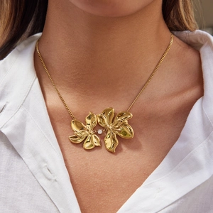 Chic 18K gold plated stainless steel bougainvillea flower necklace on a female model