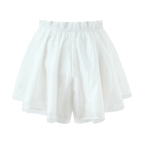 Close-up of white satin shorts with delicate lace trim and pleated elastic waistband