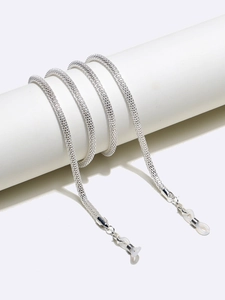 Detail of 4mm silver mesh metal glasses chain with anti-slip silicone loops on white display