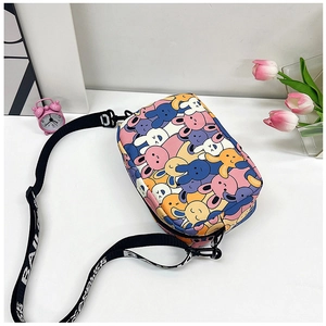 Detail view of cartoon rabbit print crossbody bag with lettered strap and zipper closure
