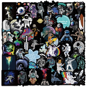 Close-up of waterproof cartoon astronaut stickers with colorful sci-fi galaxy patterns