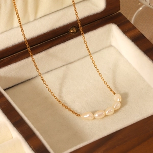 French style 18K gold plated stainless steel necklace featuring five freshwater pearls