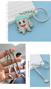Gedetailleerde tandheelkundige sleutelhanger met tandbedeltje en lasergravure opties
