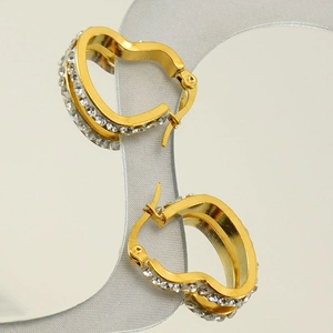 Detailed view of gold plated heart earrings with double rows of sparkling rhinestones