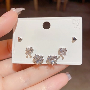 Three-pair set of S925 silver heart stud earrings with zircon bowknot accents