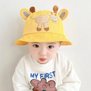 Detail of yellow cotton baby bucket hat with 3D antlers and cute deer embroidery