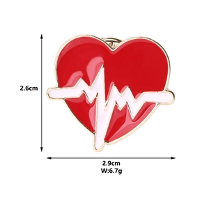 Detailed view of red heart enamel brooch with heartbeat lines and dimension measurements