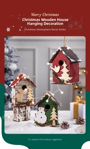 Detail of wooden Christmas house hanging ornaments with festive LED lights and rustic finish