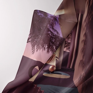 Detailed view of high-quality silk scarf texture with tropical sunset art print