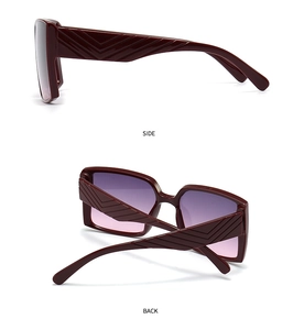 Detail view showing side and back of burgundy fashion sunglasses with V-patterned temples