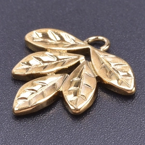 Macro detail of 18k gold plated stainless steel leaf cluster pendant for DIY jewelry