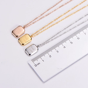 Detailed size comparison of three rectangular pendant necklaces in gold, silver and rose gold