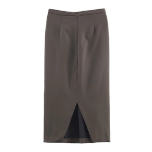 Detail view of the back slit and zipper on a dark grey midi pencil skirt