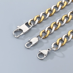 Detailed view of two-tone gold and silver Cuban link chains in three width sizes