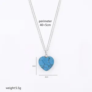 Detail view showing dimensions of heart-shaped turquoise stone pendant with silver chain