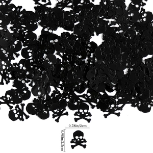 Macro detail of black skull sequins with precise size measurement for Halloween party decor