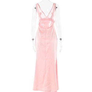 Detail of pink satin long dress featuring backless cut and elegant spaghetti straps