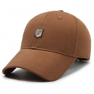 Brown cotton twill baseball cap with shield embroidery and classic six-panel structure