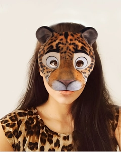 Close-up of leopard pattern cartoon EVA animal mask worn by a model for cosplay parties
