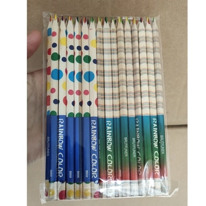 Detail view of 12 rainbow core pencils with polka dots and stripes in a clear pouch