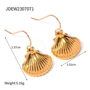 Detail view of gold shell earrings showing 2.37cm height and 5.16g weight measurements