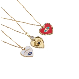 Three gold heart evil eye necklaces with red, white enamel and clear zircon charms