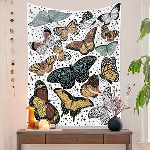 Detailed macro view of bohemian butterfly tapestry on a white wall with star patterns