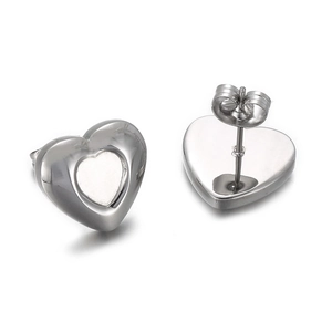 Silver hollow heart-shaped stud earrings in titanium steel with backings for women