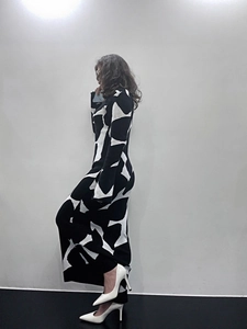 Women slim turtleneck knit maxi dress with abstract black and white print design