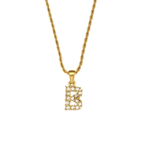 Macro shot of gold-plated twisted rope chain and zircon-studded letter B pendant