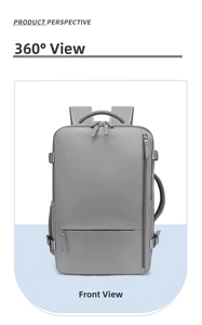Detailed view of grey travel backpack featuring side buckles and durable carry handles