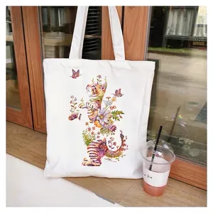 Floral canvas tote bag with colorful cat and flower print for daily shopping use