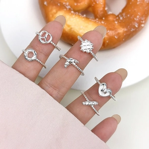 Set of 6 S925 silver rings with cute miniature pastry charms and twisted band design