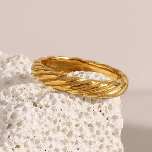 Detailed view of 18K gold plated stainless steel ring with classic diagonal twist texture