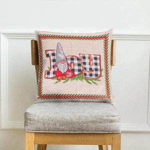 Christmas gnome JOY cushion cover in linen fabric on wooden chair for home decor