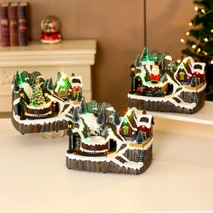 Illuminated musical rotating Christmas resin village with LED lights for festive decor