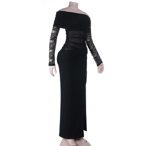 Detail of elegant black lace sleeves and sheer mesh patchwork on an off-shoulder dress