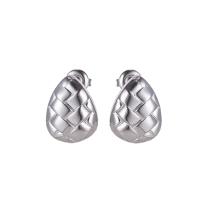 Detailed close-up of silver drop earrings featuring a woven textured metal finish