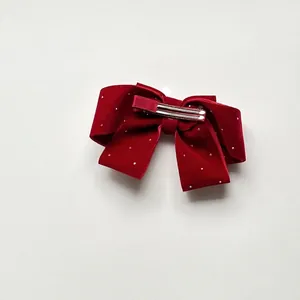 Large red velvet bow hair clip with pearl accents and metal duckbill clip for girls
