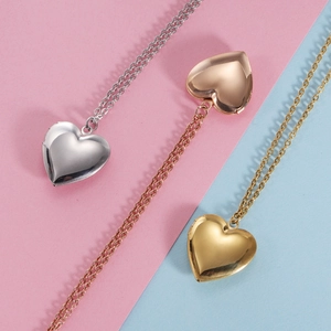Personalized 316L stainless steel heart photo locket necklaces in silver, gold, and rose gold