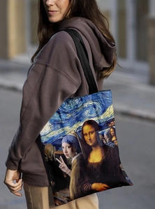 Artistic canvas tote bag with Mona Lisa print shown on shoulder in a street style setting