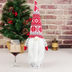 Christmas gnome wine bottle cover with red and grey knitted hat and white beard decoration