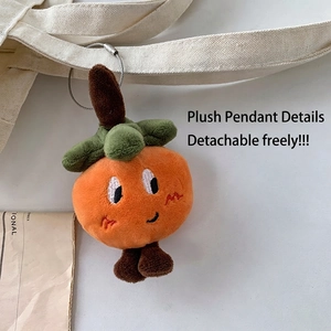 Simple minimalist canvas shoulder bag with a cute orange plush pendant accessory