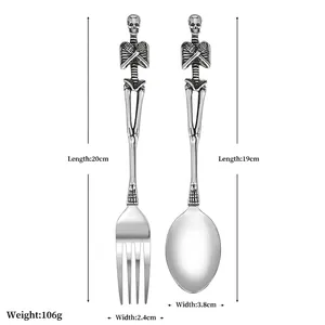 Gothic skull stainless steel fork and spoon set with skeletal bone handles in silver