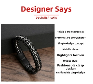 Detail view of woven black leather bracelet with silver metal chain inlay on wood
