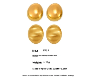 Close-up of golden oval stainless steel earrings showing dimensions 3cm by 2.5cm