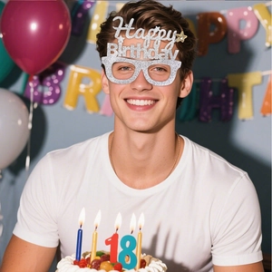 Silver glitter Happy Birthday glasses for parties shown on a model at an 18th birthday event